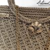 4 Pochette Bagliore di Stile: Borsa Fatta a Mano in Cordino Lurex Beige con Dettagli Oro e Spilla Floreale